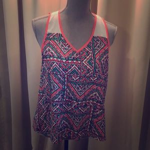‘My Michelle’ coral geometric sleeveless top.